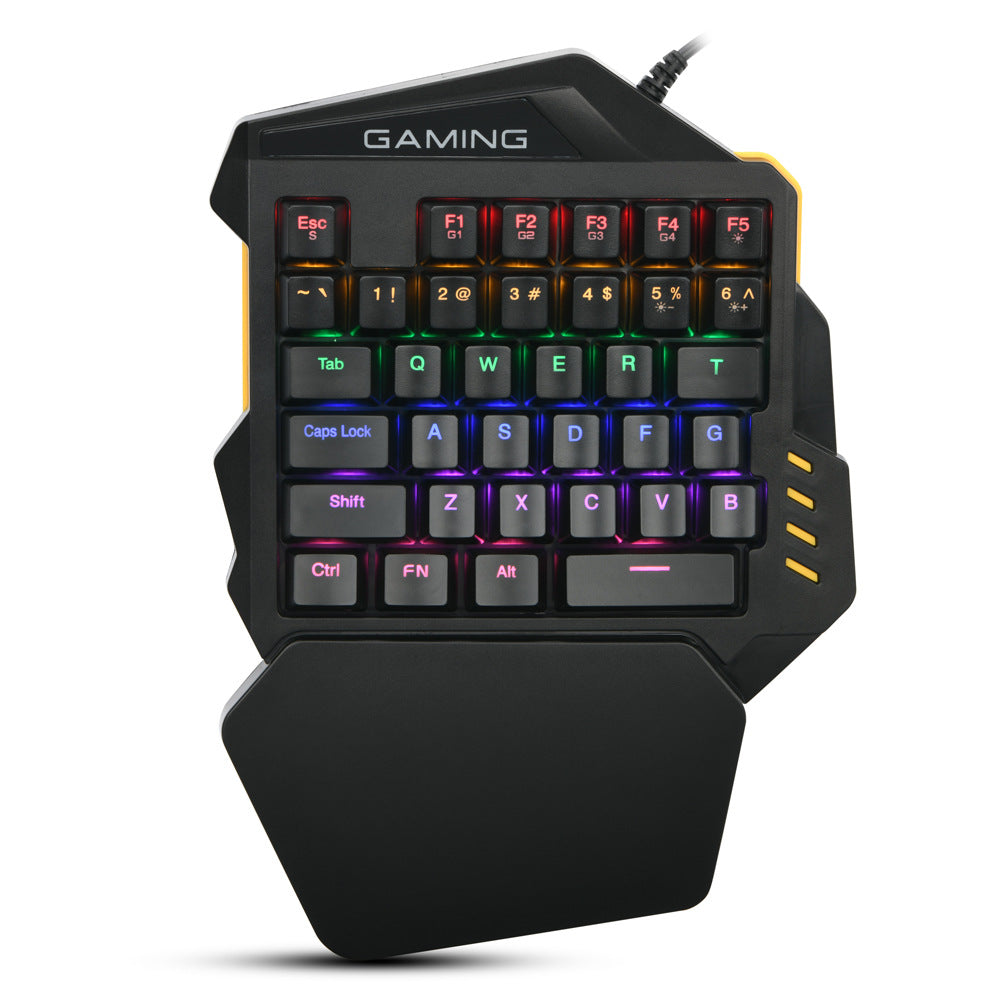 One-handed keypad on a gaming desk